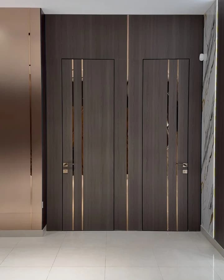 Contemporary Dark Wood Doors with Gold Accents